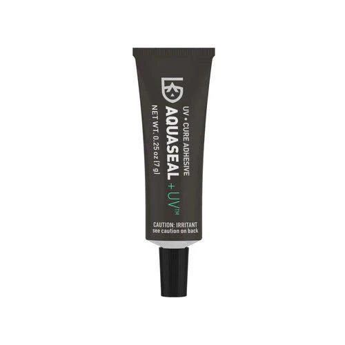 Aquaseal +UV field repair adhesive tube for instant, clear-drying outdoor gear repair.