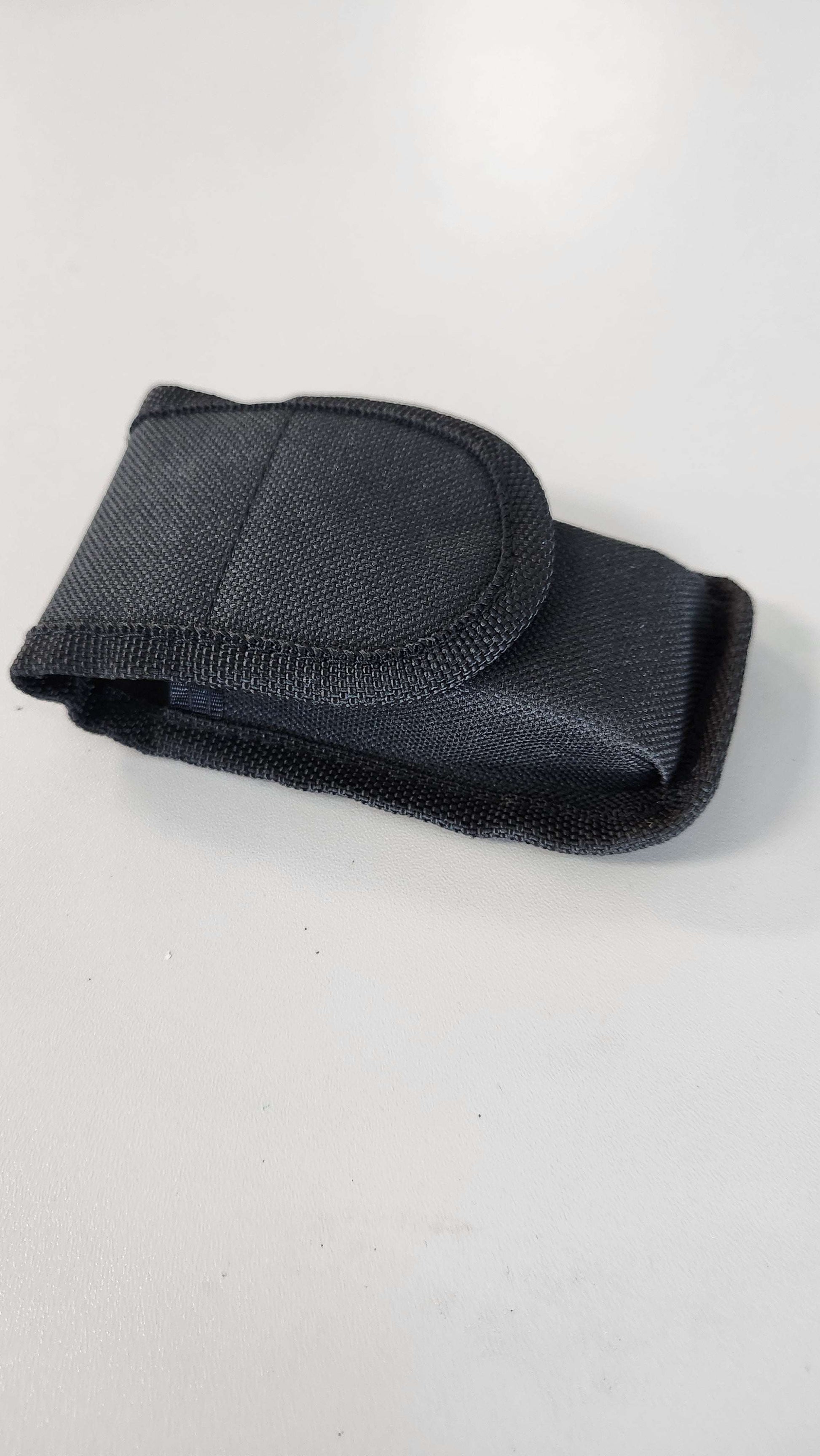 Dive tool multi-tool with 10 tool options in a black case.